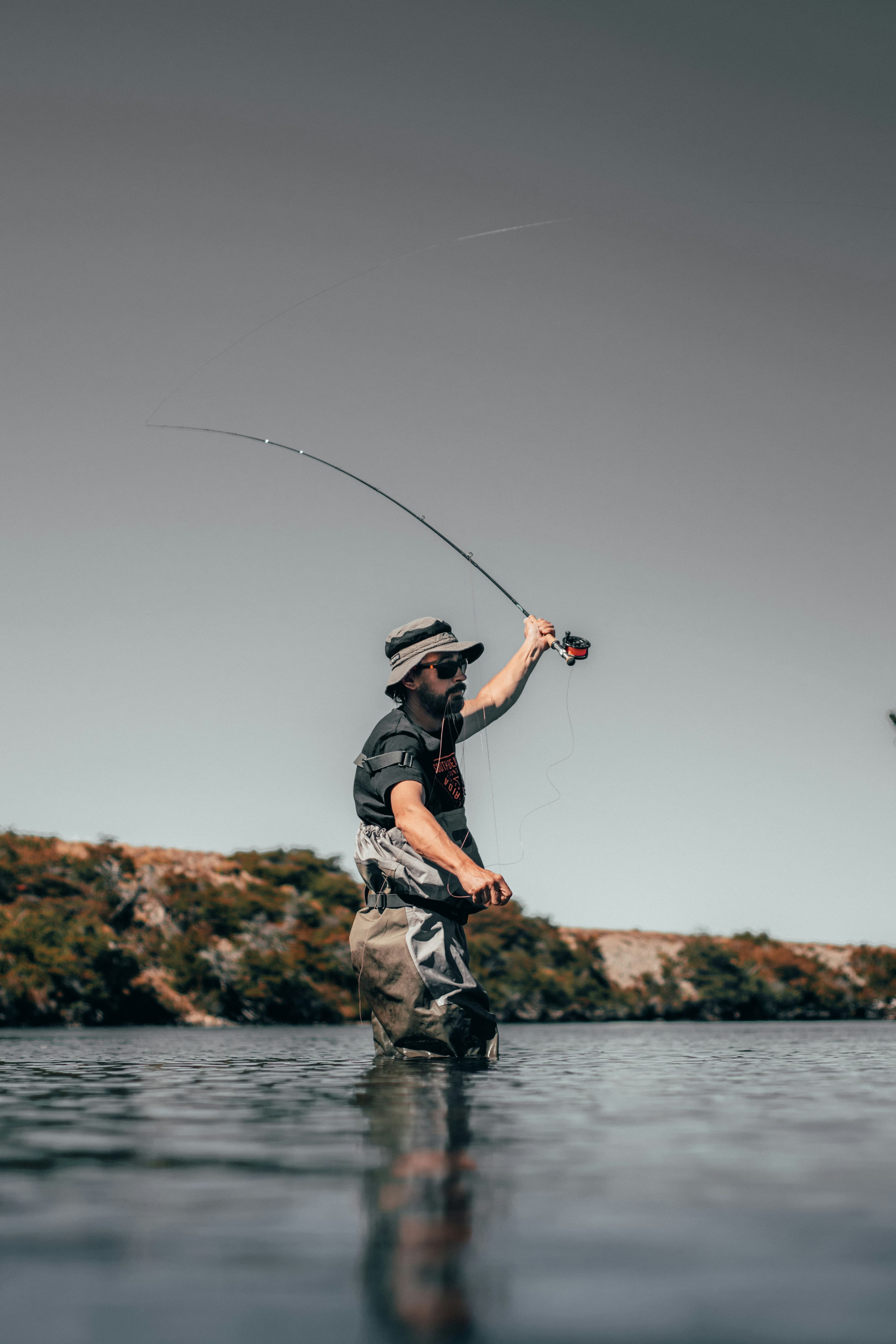 Angler casting mid-river